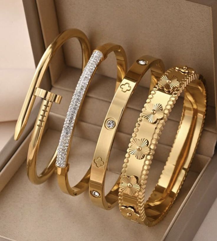 4 gold bangles in Stainless Steel