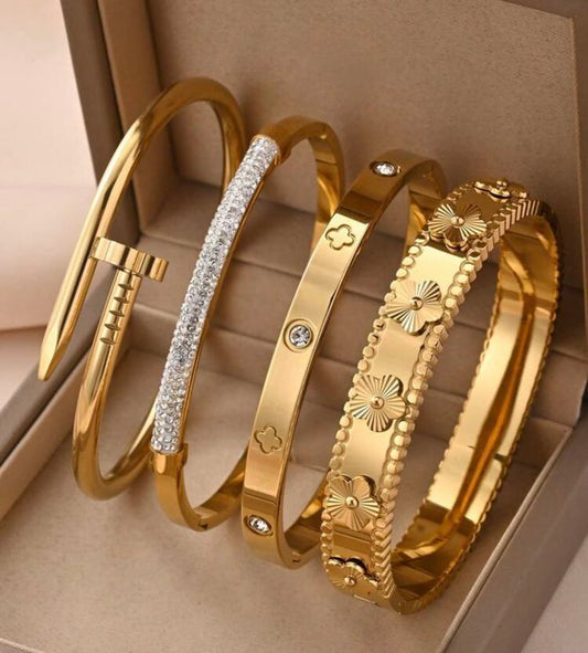 4 gold bangles in Stainless Steel